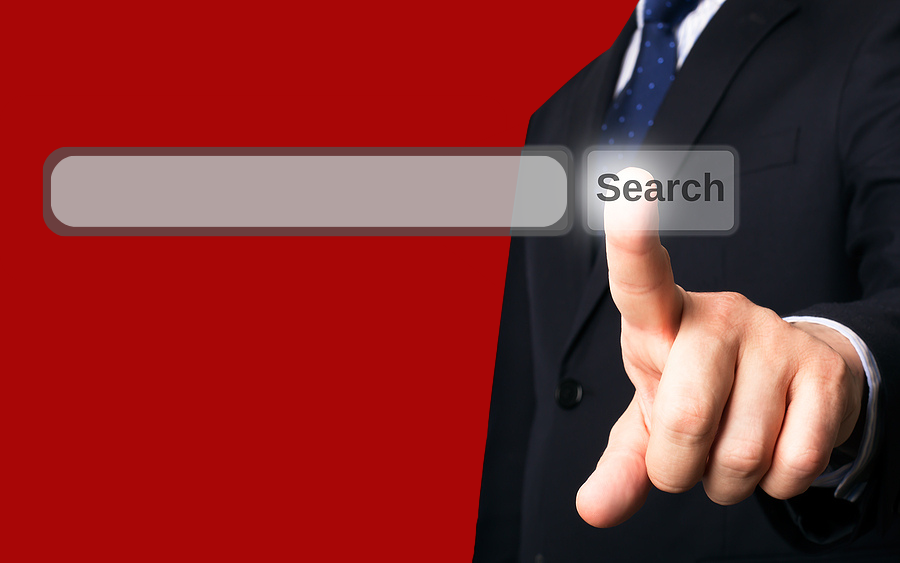 person with finger on search button to represent Sage 100 custom lookups