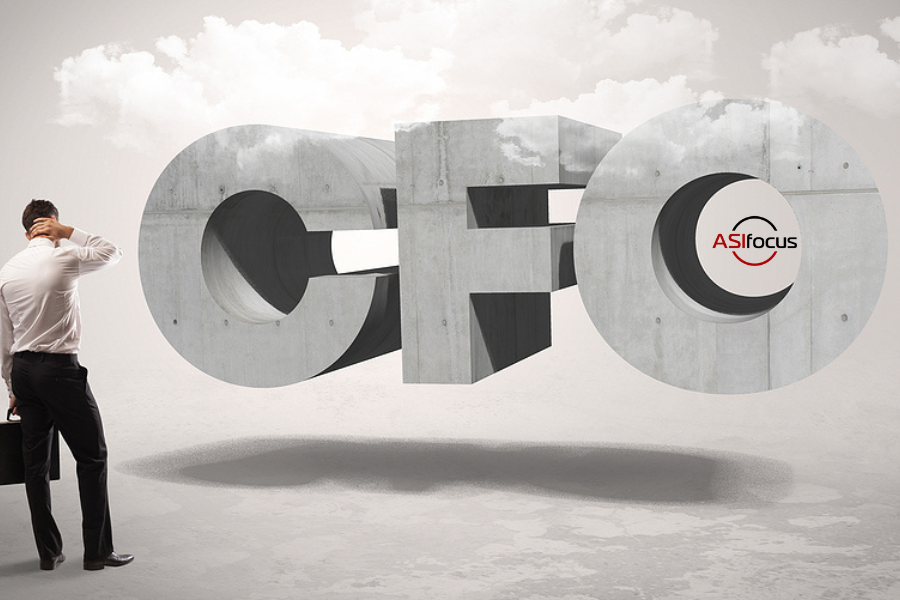 Manufacturing CFOs - person thinking in front of a 3D CFO rendering
