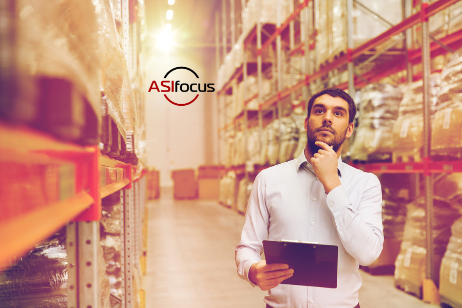 person in distribution warehouse looking perplexed