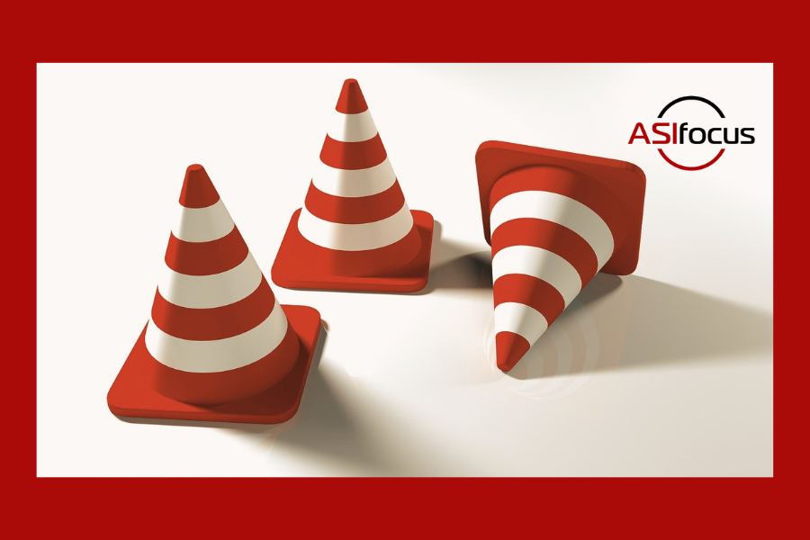 red and white construction cones. Sage HCM